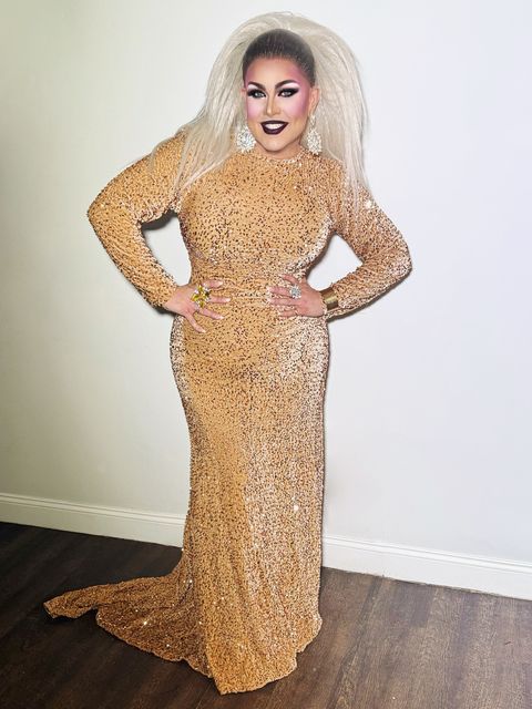 Abby Cummings in a floor-length gold sequin gown