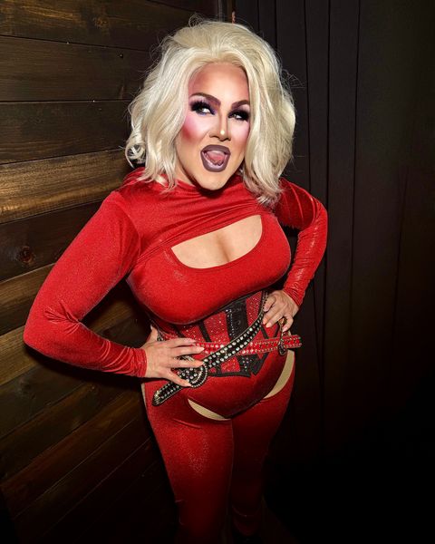 Abby in red velvet and a studded corset